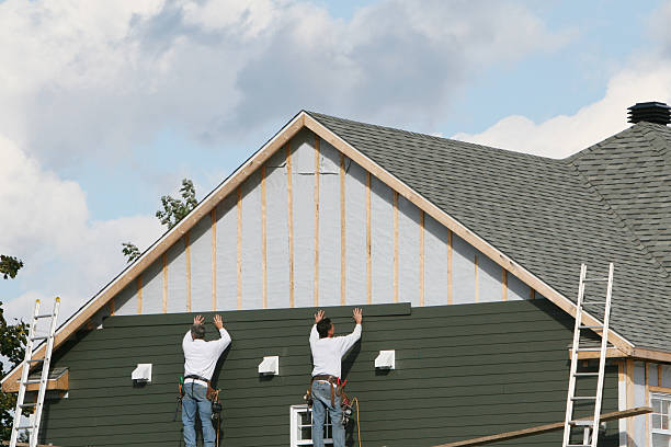 Professional Siding Installation technician working in Ashland, MA